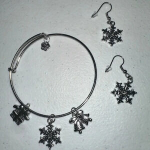 Silver winter/Christmas bracelet with snow flake earrings. Home made
